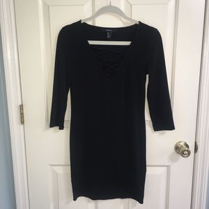 Black dress with criss-crossed neckline
